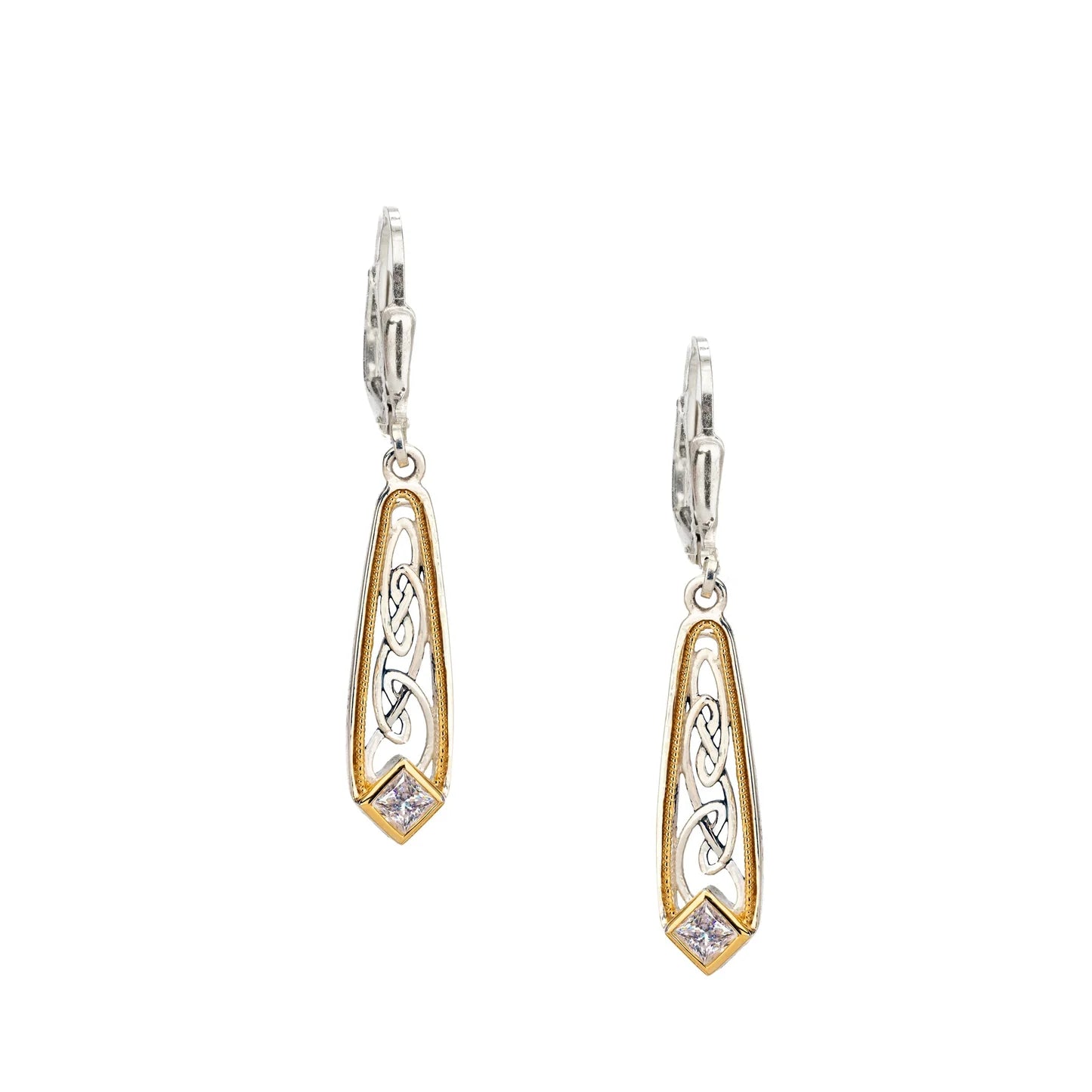 A pair of silver and gold drop earrings with Celtic knot designs and a small clear gemstone at the bottom, shown on a plain white background.
