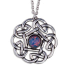 Pewter celtic knot pendant with a central gemstone on a white background