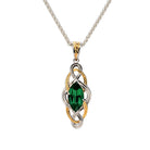 A two-tone silver and gold pendant necklace featuring a marquise-cut green gemstone at the center, set against a clean white background.