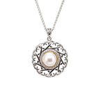 Silver necklace with a pearl pendant on a white background