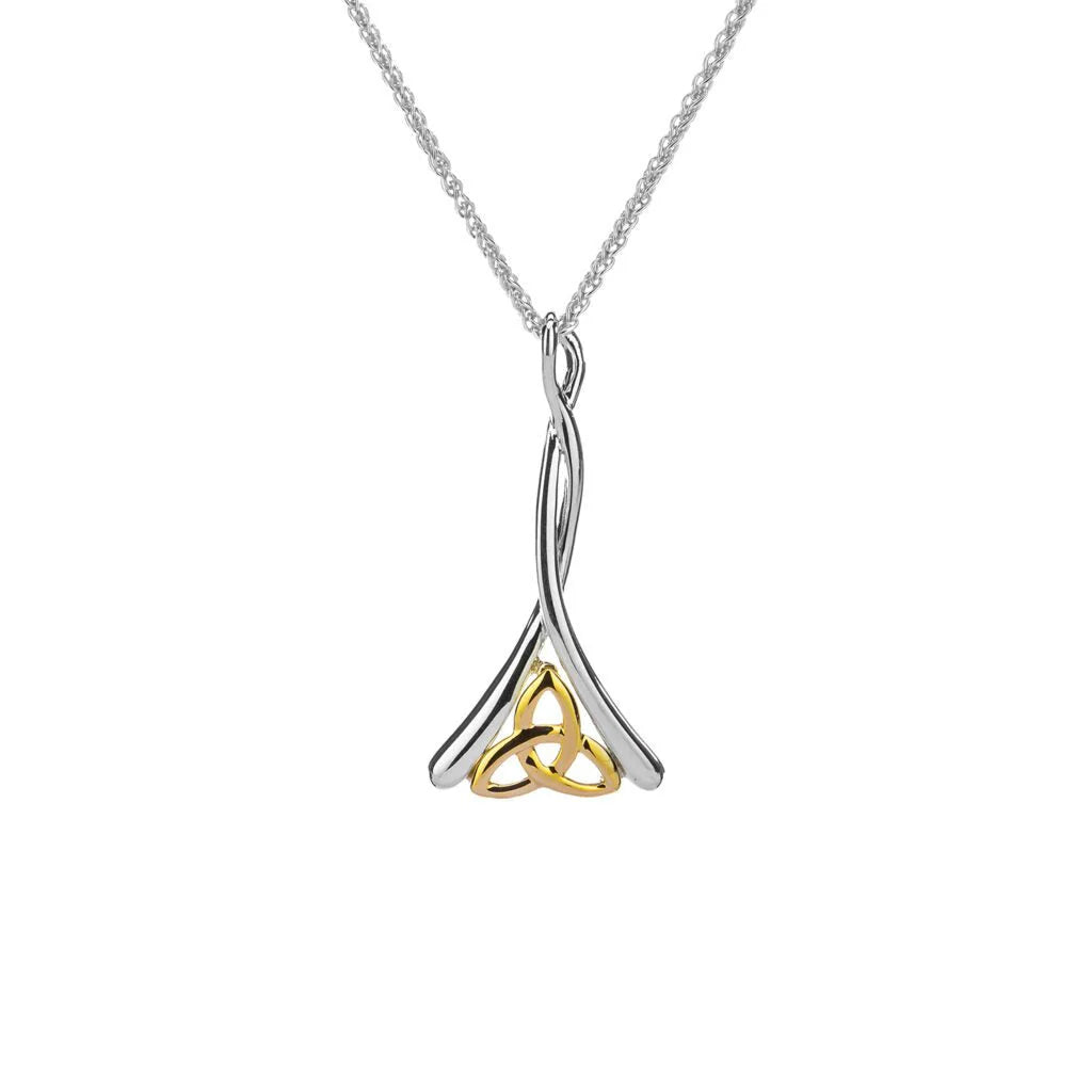 Silver and gold Trinity knot pendant on a white background