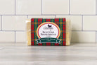 Packaged Scottish shortbread on a tiled surface