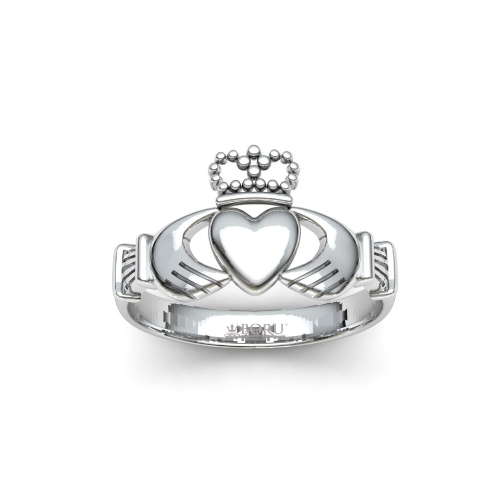 Silver Claddagh ring with a heart design on a white background