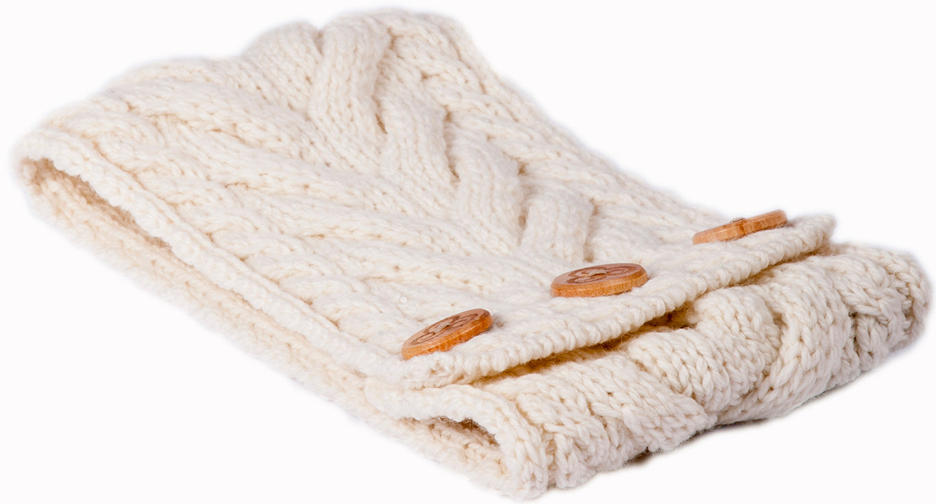 Knitted headband with wooden buttons on a white background
