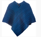 Blue knitted poncho on a white background