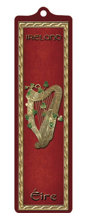 Decorative item with a harp design on a red background, featuring the word 'Ireland' at the top.