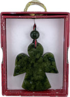 Green angel-shaped ornament in a red box with a white background