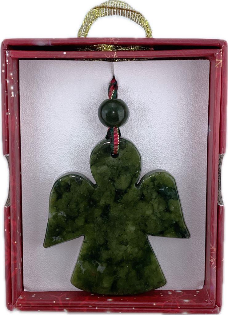 Green angel-shaped ornament in a red box with a white background
