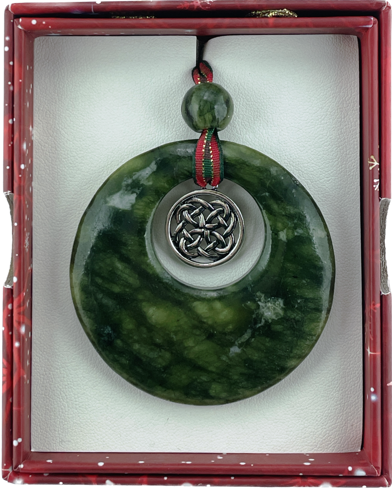 Green Irish connemara marble pendant with silver emblem in a red box