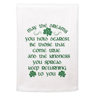 White towel with green text and shamrock symbols on a white background