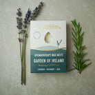 Enniskinn aromatherapy wax melts packaging with lavender and rosemary on a neutral background