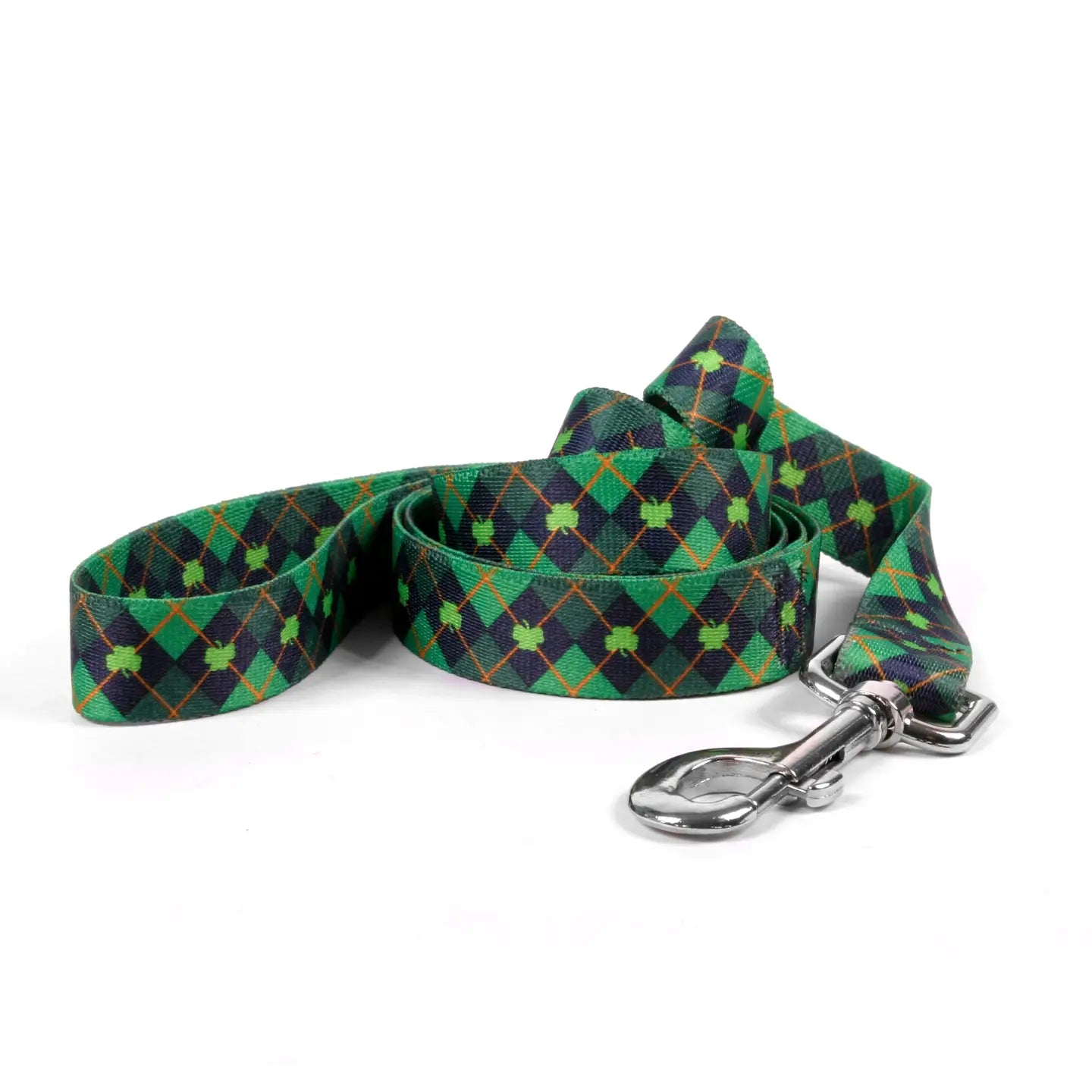 Green and black plaid dog leash with a metal clip on a white background