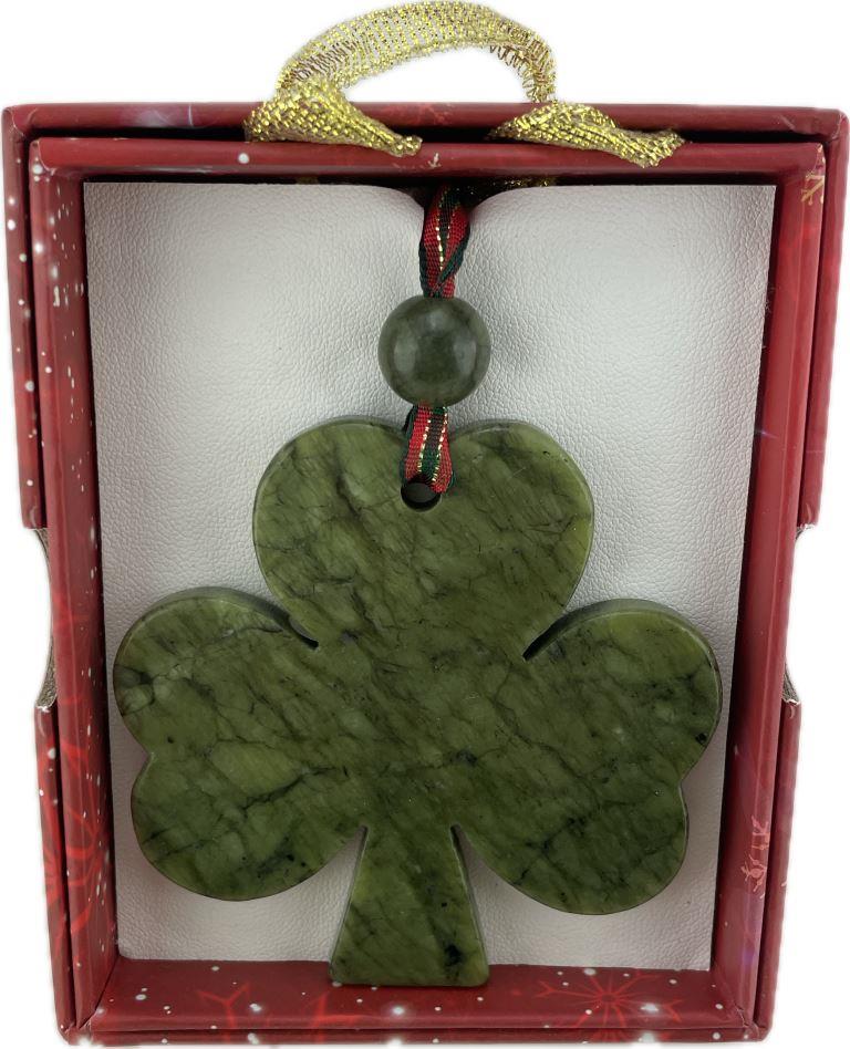 Green shamrock ornament in a red box with gold handle
