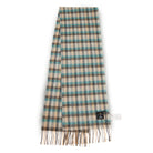 Plaid scarf with fringes on a white background