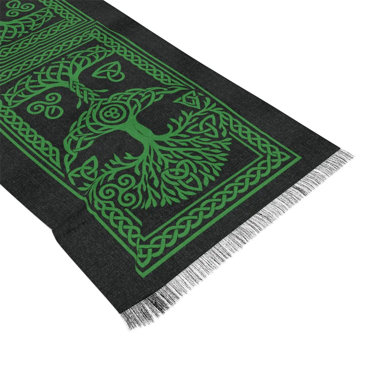 Black scarf with green pattern on a white background