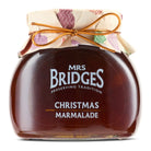 Jar of Mrs. Bridges Christmas Marmalade with decorative paper and bow on a white background