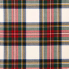 A close-up of a classic tartan plaid fabric pattern featuring red, green, navy blue, pink, and yellow stripes on a white background.