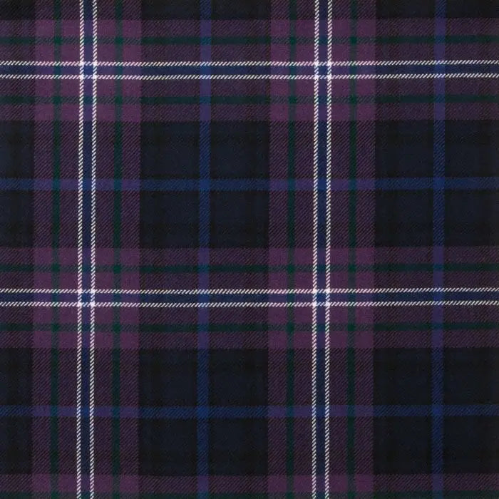 A close-up of a tartan plaid fabric pattern with a dark navy base, purple and green stripes, and thin white intersecting lines.