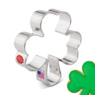 Metallic shamrock-shaped cookie cutter with 'Made in USA' label on a white background