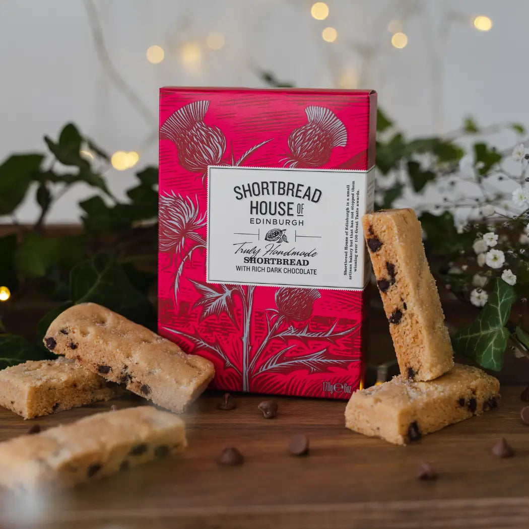 Box of Shortbread House Edinburgh shortbread with cookies on a wooden surface