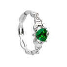 Silver ring with a green gemstone on a white background