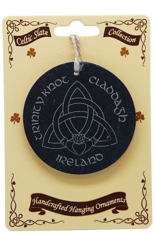Celtic knot design on a black round ornament with 'Ireland' text, on a decorative beige card.