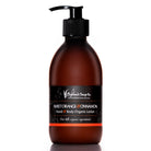 Brown bottle of Highland Soap Co. Sweet Orange & Cinnamon hand and body organic lotion on a white background