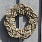 Nautical rope knot wreath on a wooden door