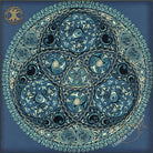 Decorative circular design tee shirt with intricate patterns on a blue background