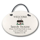 Decorative sign with text 'Welcome to our Irish home' and a small illustration of a cottage.