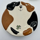 Ceramic plate with a dog design on a white background