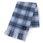 Plaid scarf with fringes on a white background